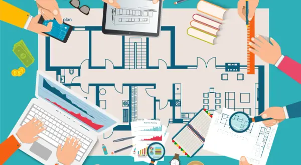 Teamwerk aan een bouwplan: hoe pak je een verbouwing aan? Met blauwdrukken, laptops, geld en koffie.