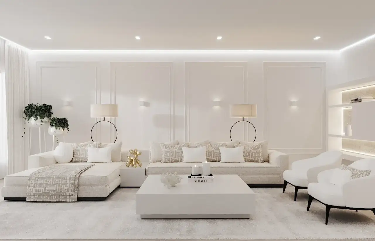 Luxe woonkamer met witte banken, bijzettafels, planten en decoratie. Een perfecte plek om te ontspannen, wat is een vide?